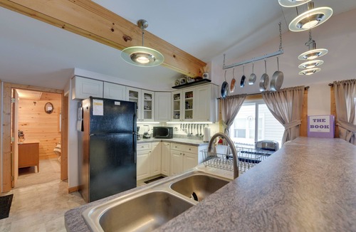 Carp Lake Cottage | Private Dock & Views! Family Home on Paradise Lake
