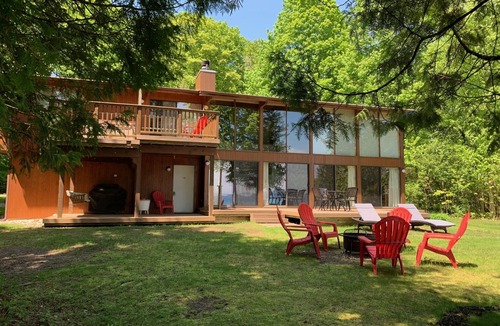 Suttons Bay House | Private Lakefront Suttons Bay Home with Hot Tub, Newly Renovated Beach and A/C!