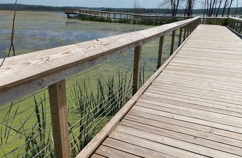 Lake Township Cottage | Relax and play in the blue waters of Crystal Lake