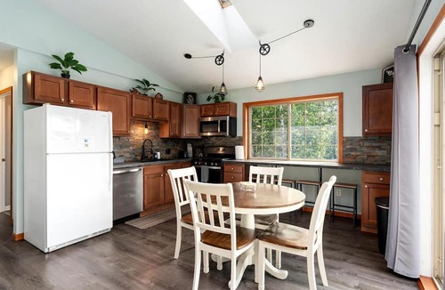 Hessel Cabin | Riverfront Cabin Incredible for Outdoor Enthusiasts with Kayaks in Hessel, Michigan
