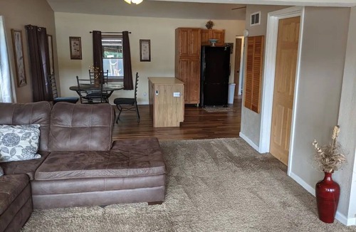 Colton Cottage | Riverfront Cottage with Hot Tub, Kayaks, Canoes, & Fishing Boats!
