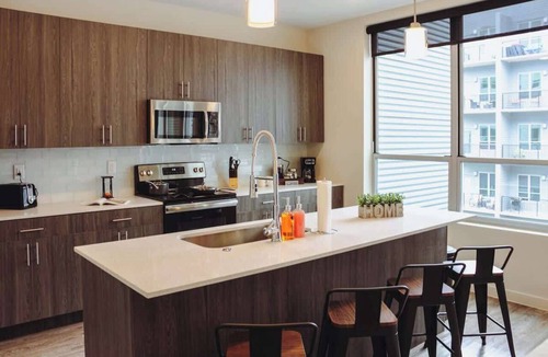 West Main Historic District Apartment | Rooftop Views in Downtown | Pool & Free Parking