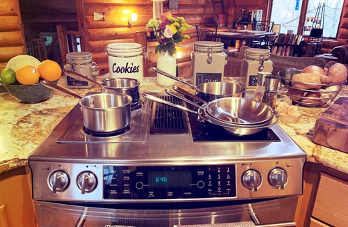 Colgate House | Rustic Charm: Pewaukee Lake Cabin, Sauna & Hot Tub