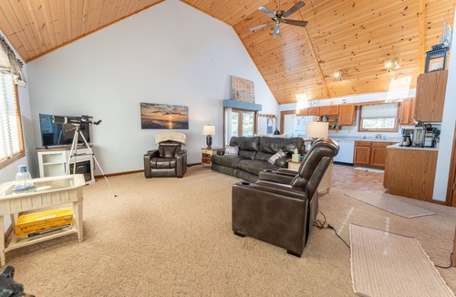 Manistique House | Sandbox on Michibay: Autumn on Lake Michigan – Fall Colors & Cozy Nights Await!