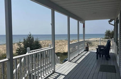 Manistique House | Sandbox on Michibay: Autumn on Lake Michigan – Fall Colors & Cozy Nights Await!