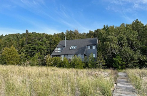 Northport Cottage | Secluded beachfront cottage in Northport with stunning sunsets on Lake Michigan