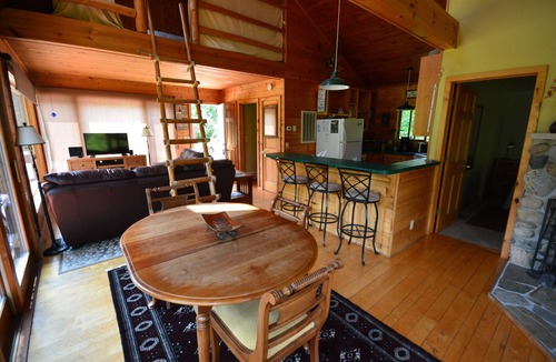 Mayfield House | Secluded Boardman River home with a HOT TUB, Smart TV, Kayaks. Dogs ok