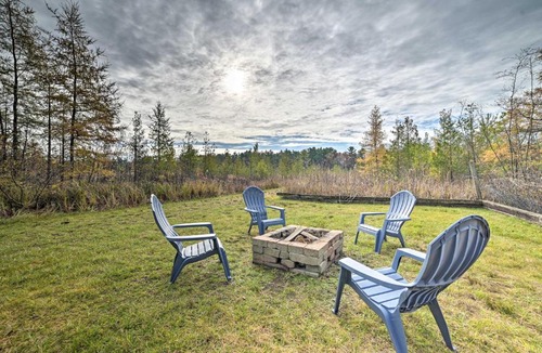 Rapid City House | Serene Riverfront Home with Torch Lake Access!