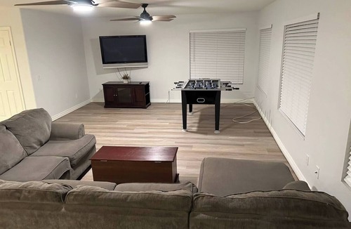 Eastvale House | Set beside a golf course in Eastvale, this spacious 3,099 sq. ft. furnished home offers four bedrooms, a private non-heated pool, dedicated workspace, and inviting indoor and outdoor living areas. Designed for 30+ day stays.