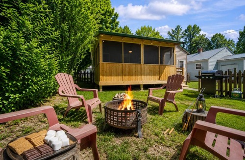 Paw Paw Lake House | Short Description: Lakewood Bungalow | Screened Porch 2 Baths Basement Hangout Walk to Lake Onsite Laundry