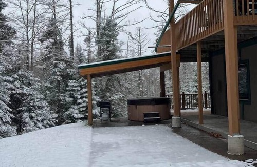 Stambaugh House | Ski getaway with hill view and hot tub- Lower unit