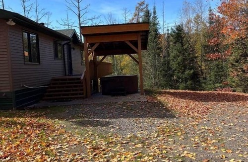 Stambaugh House | Ski getaway with hill view and hot tub- Upper Unit