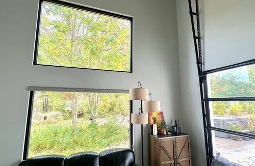 Stevensville House | Sleek forest retreat: karaoke, spa, campfire, pool table, grill, outdoor games