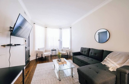 Logan Square Apartment | Spacious 3-bedroom retreat in West Logan with modern amenities, perfect for families looking to relax and explore vibrant Logan Square.