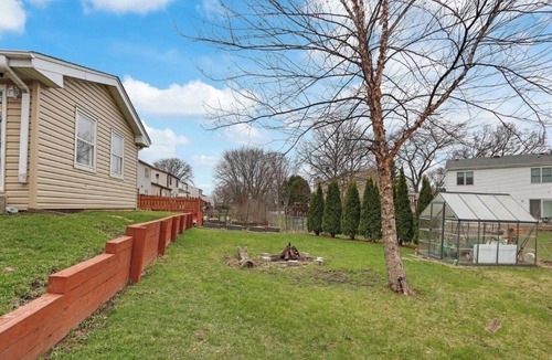 Carol Stream House | Spacious Chicagoland Retreat with Hot Tub + Fireplace Sleeps 8+