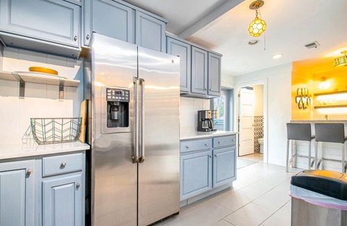 Grand Beach House | Spacious, dog-friendly home with a gas fireplace, pool, hot tub, & golf carts