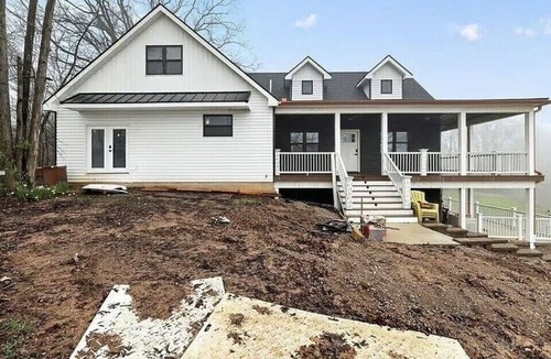 South Lyon House | Spacious Riverfront Retreat With Wraparound Porch And Room For The Whole Team