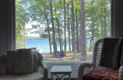 Hubbard Lake House | Spacious vacation home on large private wooded lot on crystal clear Hubbard Lake
