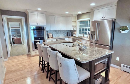 Suttons Bay House | Spectacular Suttons Bay Stay - Game Room, Kayaks, Pizza Oven & More!