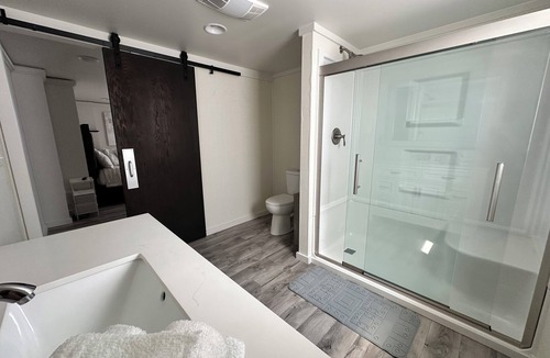 Cass City Apartment | Stay in a Converted Church private bathroom king bed 70” TV Wi-Fi keyless entry