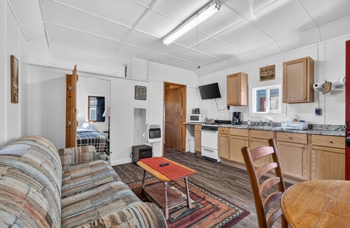 Curtis Cabin | Stone's Throw Cabin 2- Cozy one bedroom with full kitchen and screened porch