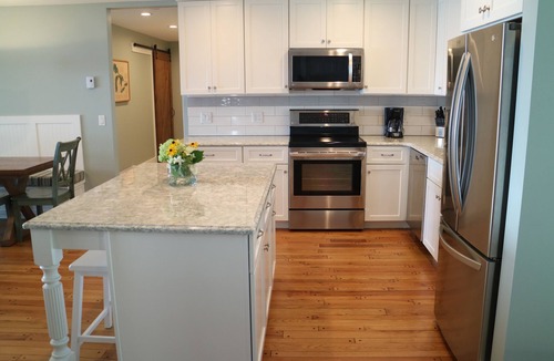 Suttons Bay Cottage | Stunning 150' ft footage on bay, 2 beachfront homes, 5 bedrooms & game room.
