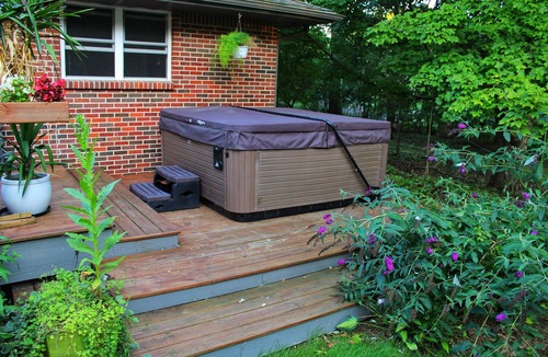 Walker House | Suburban Garden on 1.5 acres with pool and hot tub