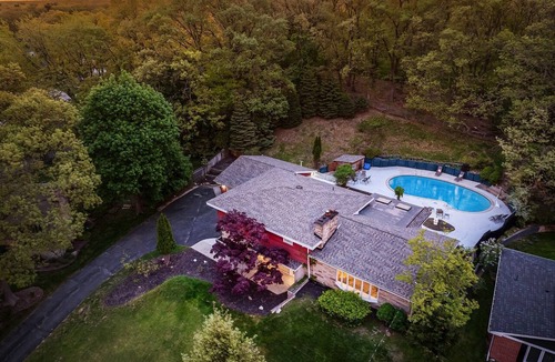 Norton Shores House | Swimming in the Woods