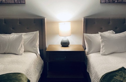 Wellston Bed & Breakfast | The Woods Suite #303 Free Arcade, Movie Theater, Patio Area, Playground and more