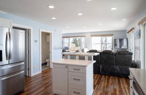 Mears House | This charming vacation home sits directly on Lake Michigan and it delivers!
