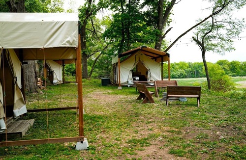 East Troy RV Rental | Three Rustic Glamping Tents for a Unique Group Adventure in Nature in Troy, Wiconsin