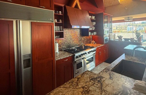 Bay Harbor Condo | Top of the World 500: Luxurious 4-bedroom condo in Bay Harbor with marina views.