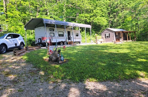 Danville RV Rental | Tranquil campsite with AC in the woods of Danville