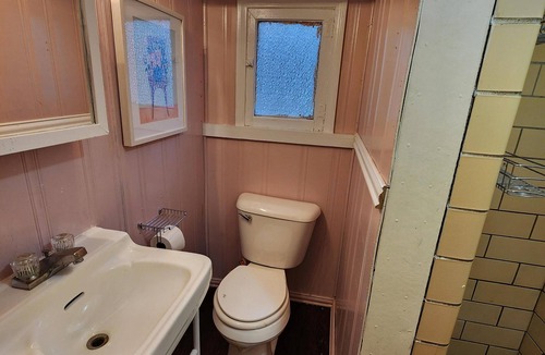 Monticello Cabin | Two Bedroom Cabin - Street & Pool View - Two bedroom cabin conveniently located at Outrigger Resort, right down the road from Indiana Beach Amusement Park! This 600 sq ft classic cabin offers two (2) queen beds and two (2) futons to sleep six (6)! Am