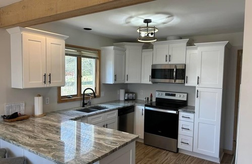 Harbor Springs Condo | Updated Phase 2 Hideaway Valley Condo Nestled in the Woods