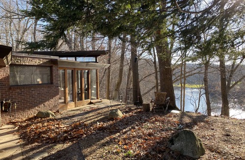 Alaska Ski Chalet | Usonian Frank Lloyd Wright Inspired River House on the Thornapple River