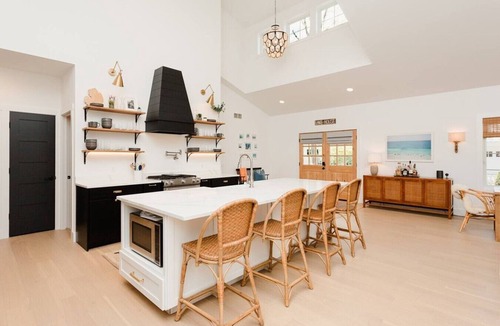Grand Beach House | Vue du Lac 4BR 3BA Across from Beach Fire Pit Walk to Golf & Pickleball