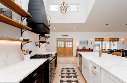 Grand Beach House | Vue du Lac 4BR 3BA Across from Beach Fire Pit Walk to Golf & Pickleball