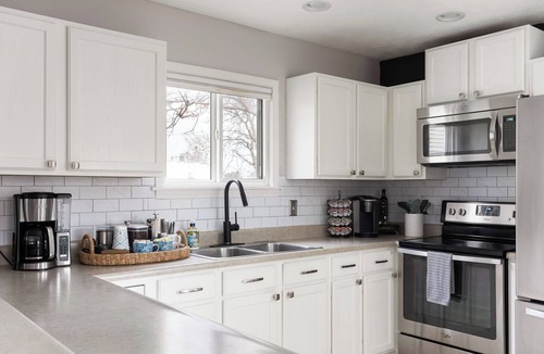 Babe Denny House | Walk to Stadium & Convention, Pet-Friendly w/Fence, Well-Stocked, Hot Tub
