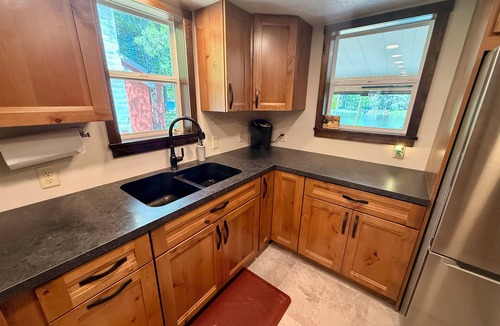 Manistique House | Waterfront Cabin w/Private Dock & Outdoor Bar near Munising/Manistique