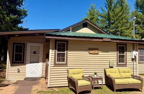 Manistique House | Waterfront Cabin w/Private Dock & Outdoor Bar near Munising/Manistique