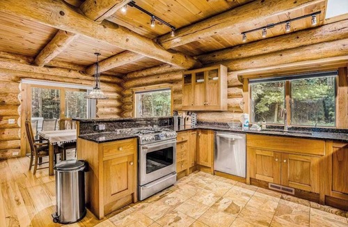 Thompsonville House | Waterfront home on Betsie River with hot tub & sauna near skiing at Crystal Mtn