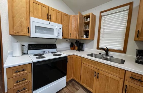 Jim Falls House | Waterfront legacy farm cottage house with WiFi, AC in lovely Eau Claire