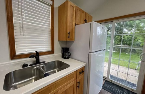 Jim Falls House | Waterfront legacy farm cottage house with WiFi, AC in lovely Eau Claire