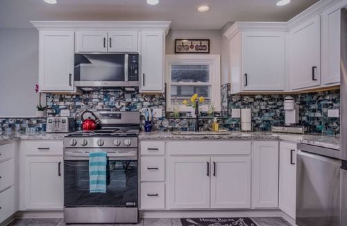 McHenry House | Waterfront Vacation Rental on Fox River | Walk to Downtown McHenry | 3BR/2BA Home with Private Pier