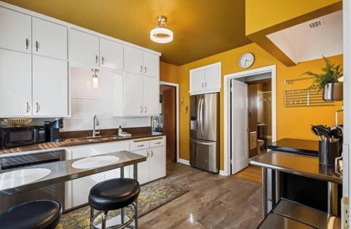 Milwaukee House | Welcome to the Charming Stone Haven, a beautiful three bedroom property.