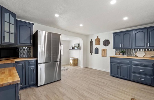 Village of Pewaukee House | Well Appointed Home Steps from Pewaukee Lake