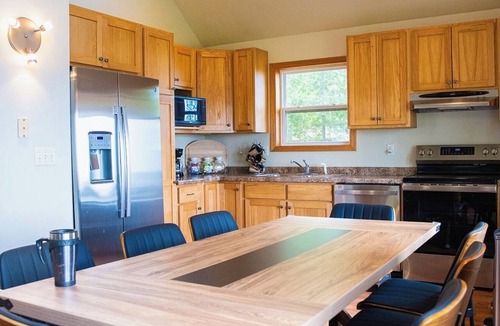 Oconto House | Where world class fishing meets serene woodland luxury.