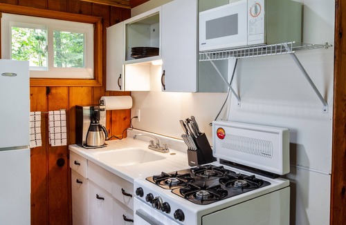Gwinn Cottage | Wooded Lakeside Cottage ,Fishing, Snowmobiling, Hunting, Boats, Hot Tub