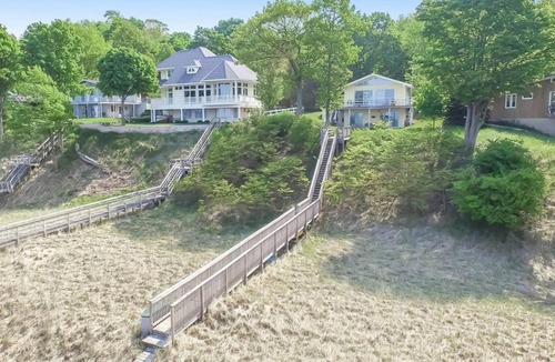 Port Sheldon Cottage | Your private beach. The week sells fast so book your Lake Michigan get away now!